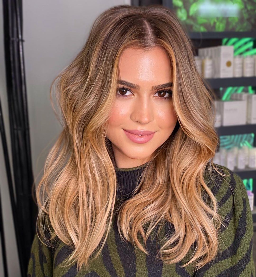 Long Tousled Hairstyle with Midshaft Wave