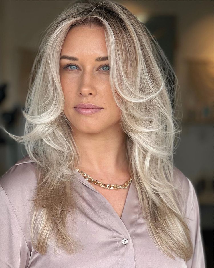 Wispy Pearl Blonde Hair with Flipped-Up Pieces