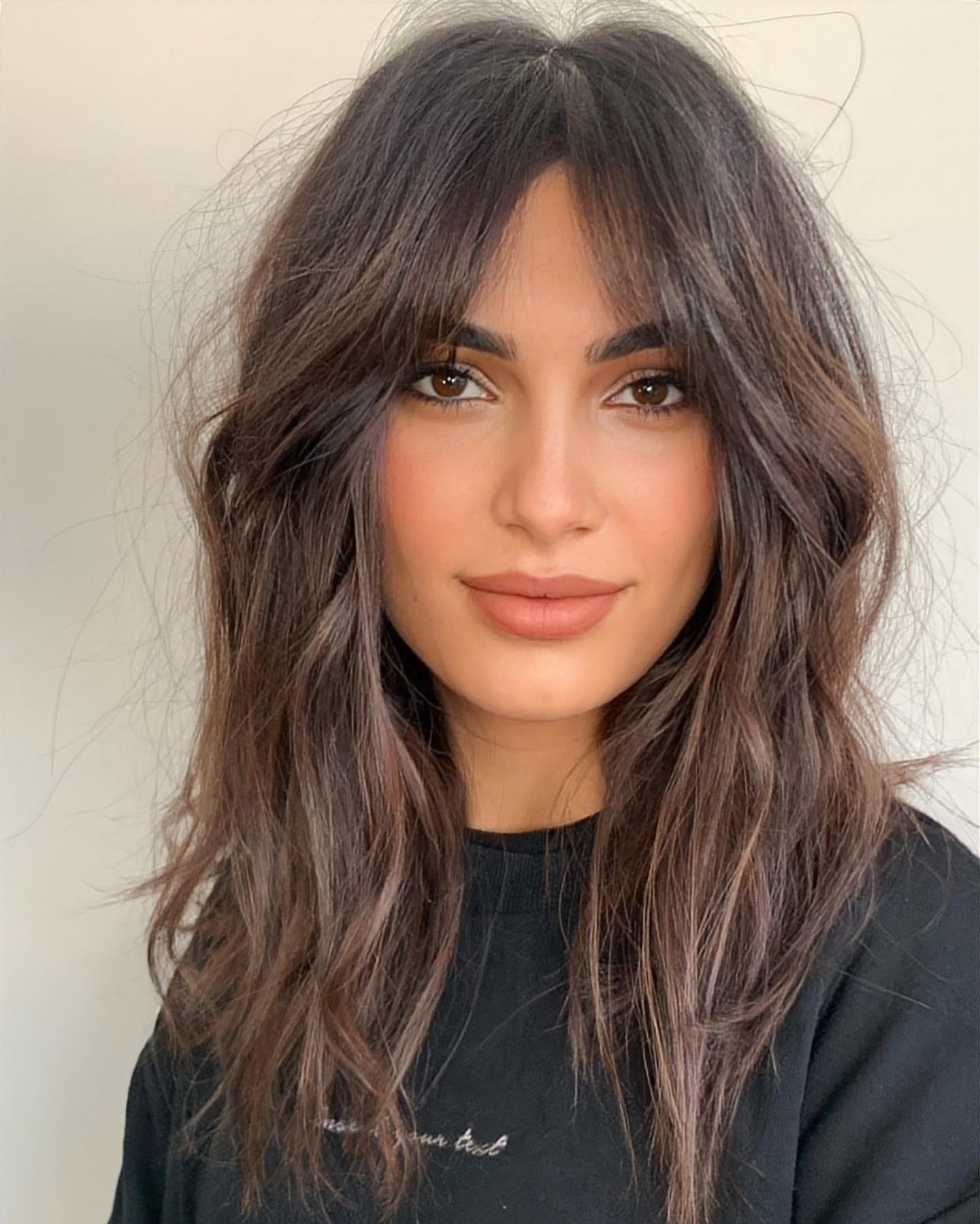 Longer Tousled Brunette Shag with Bangs